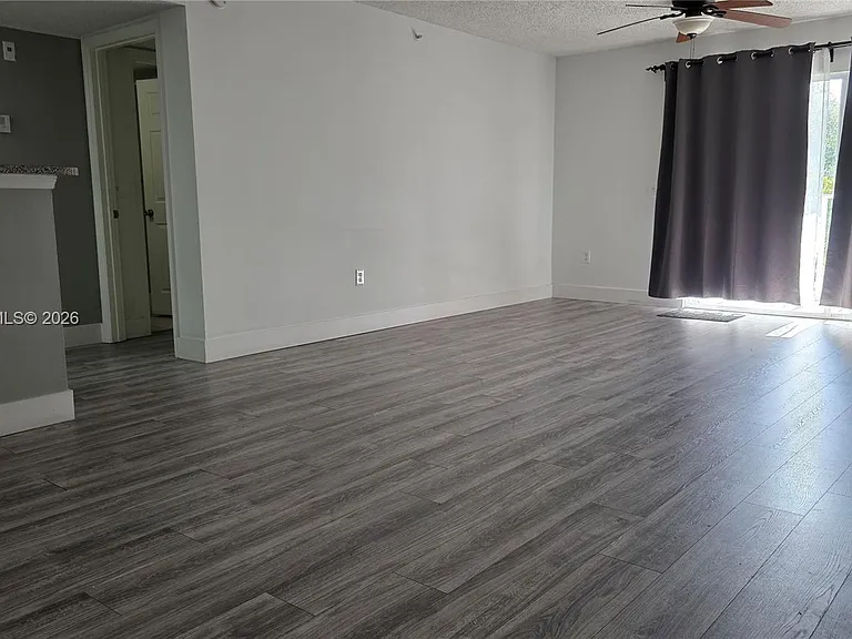 5011 Wiles Rd #203 — Photo 12