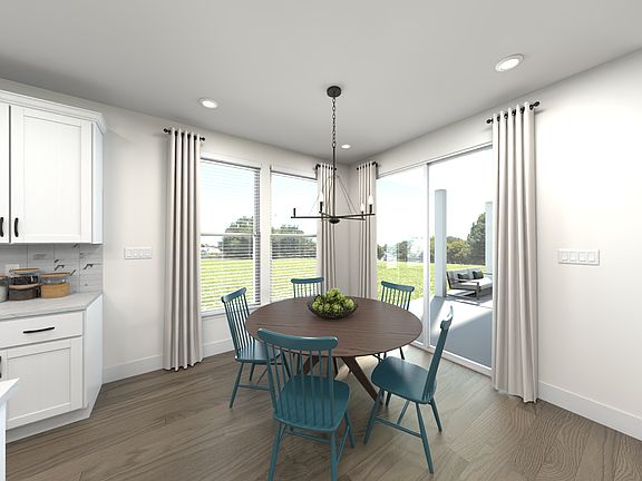 The open-concept floorplan allows for an easy flow between the kitchen and dining areas.