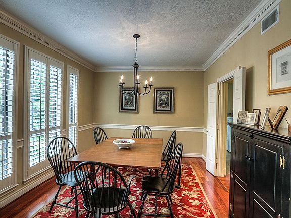 Formal dining is spacious it can easily accommodate a large family gathering.