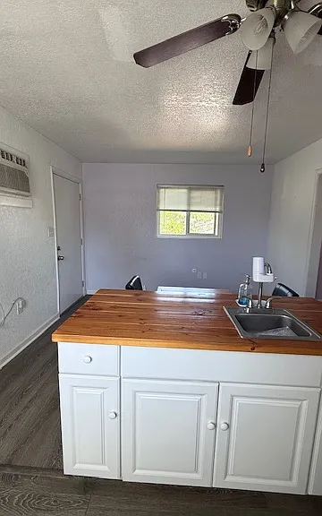 kitchen bench , cabinets and sink