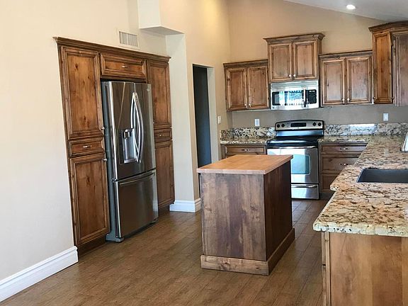 4th image of 7669 N Pinesview Dr