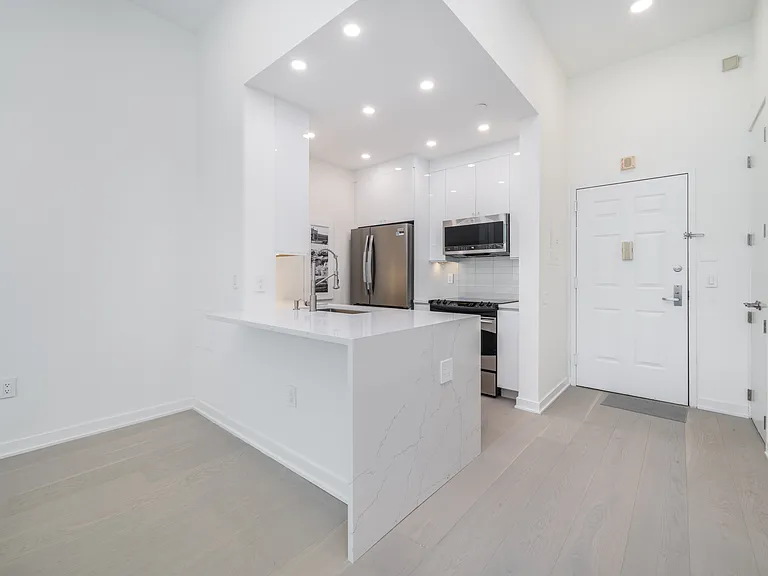 Quartz countertops Kitchen with space for bar stools