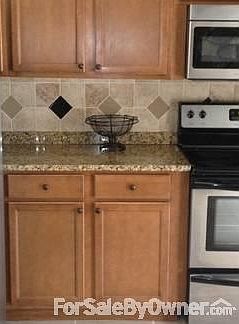 kitchen,
						:
						all new stainless steel appliances included
