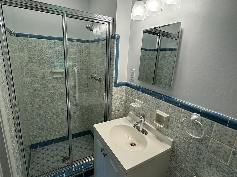 Primary Bedroom au suite Bath
Redone with original tile
