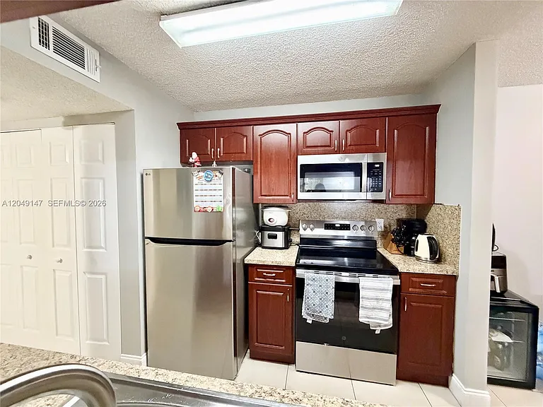10521 SW 158th Ct #203 — Photo 7