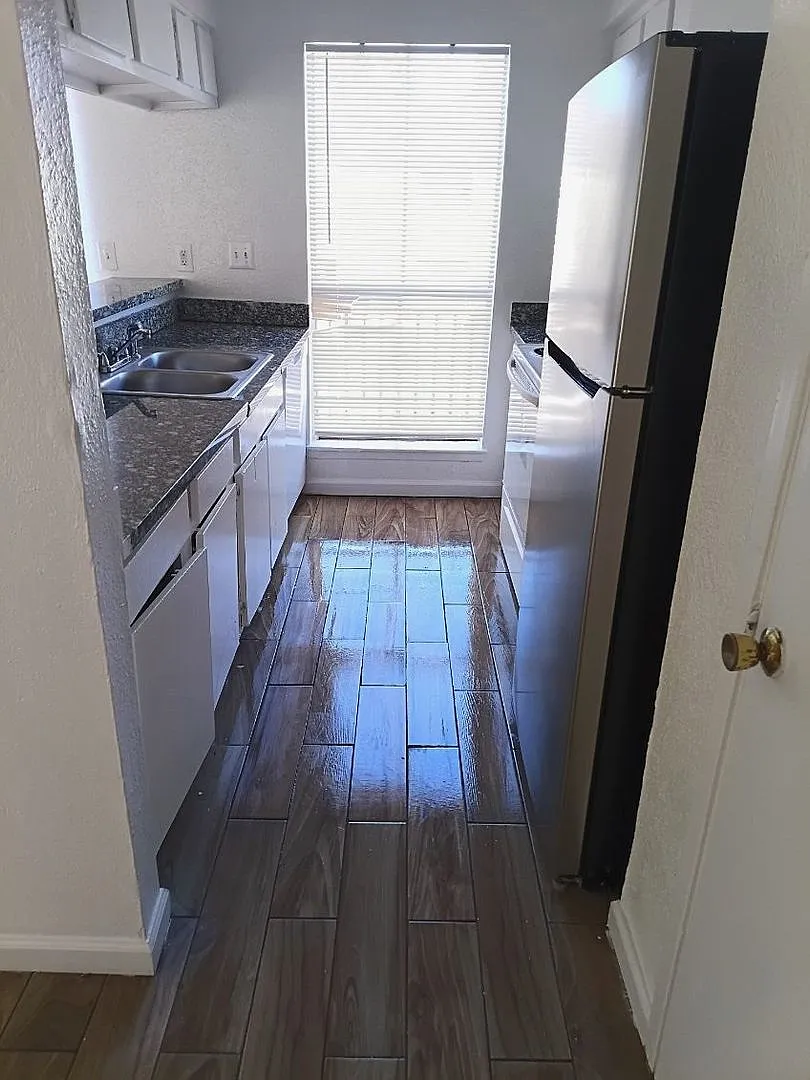 3 BR Condo — Photo 2