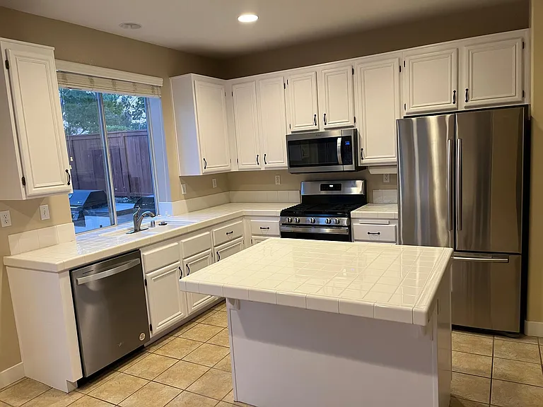 Large kitchen island with breakfast bar
