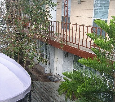 small courtyard area and upper units