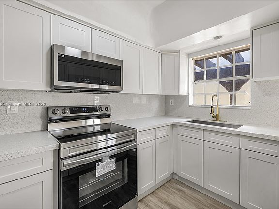 2nd image of 3860 W 10th Ct #3860