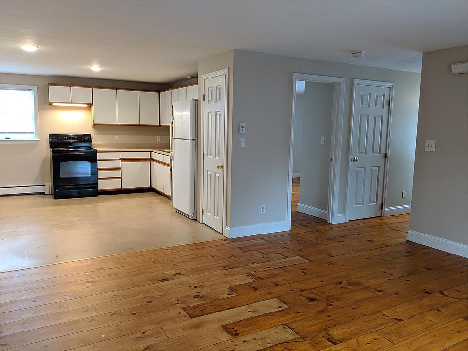 living room and kitchen from perspective of front door