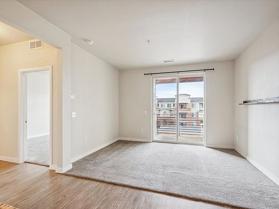 Family room with balcony with mountain views