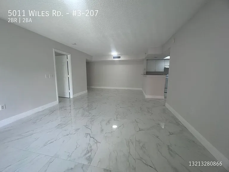 5011 Wiles Rd #3-207 — Photo 11