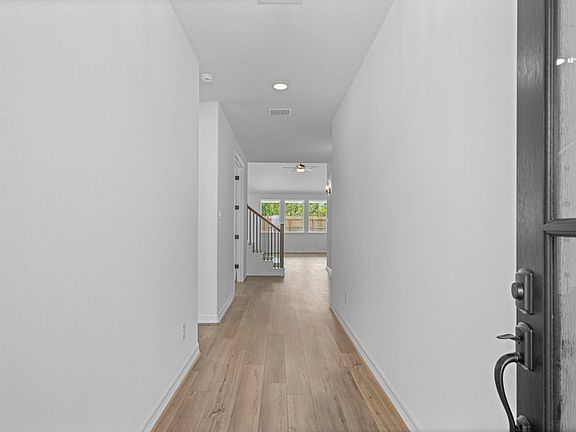 Welcome home! Step inside through the inviting entryway that seamlessly flows into the open-concept