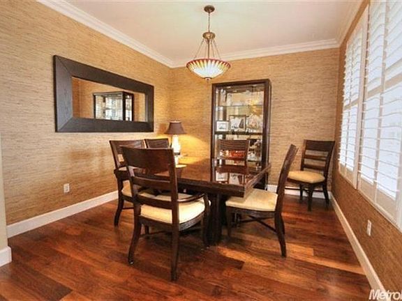 From the moment you walk in the front door you will be charmed by the warmth and style that this home offers.  No plain-vanilla-builder-grade=beige-home here.  The sellers family owns a interior design and furnishings business and this home has reaped the