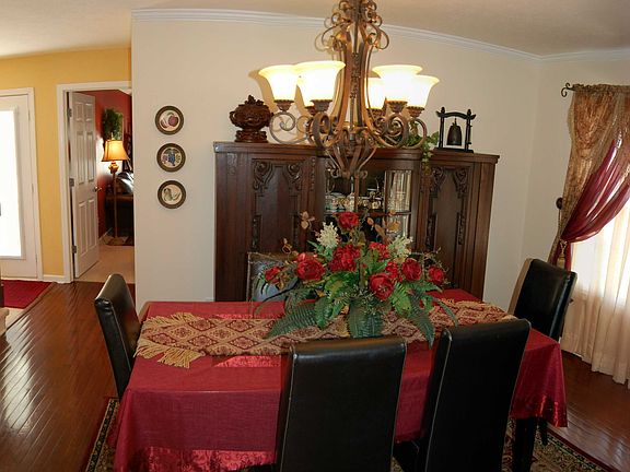 Gorgeous Formal Dining Room. You can see entrance to downstairs Master Suite.