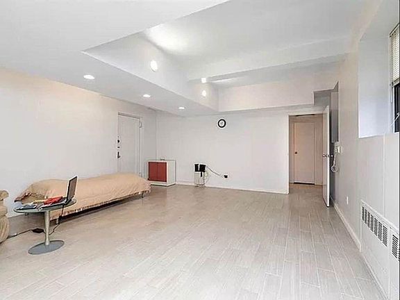 Spacious and bright living room with new floors
