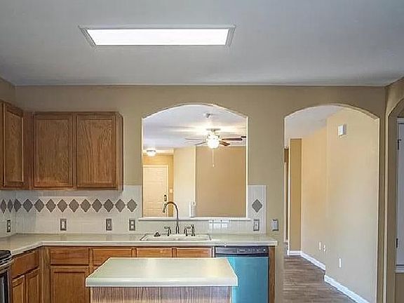 Kitchen has stainless steel appliances.