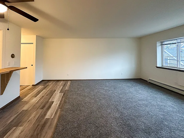 2 Bed / 1 Bath - 1,000 SF - Living Room + Bar