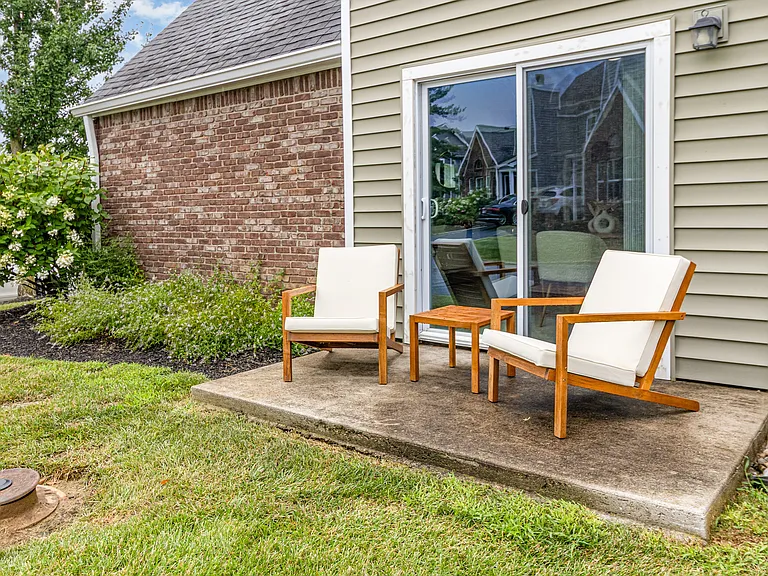 Step outside and enjoy a cozy spot designed for relaxation, perfect for morning coffee or unwinding after a long day.