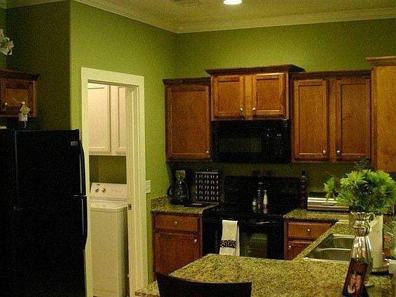 Kitchen with granite counters. All appliances are included.