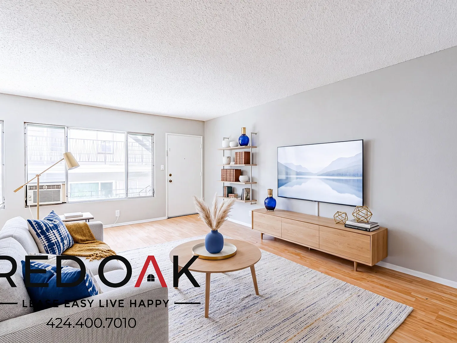 Spacious 1-Bed with Open Floor Plan, Air Conditioning, On-Site Laundry and Parking Included in th... — Photo 3