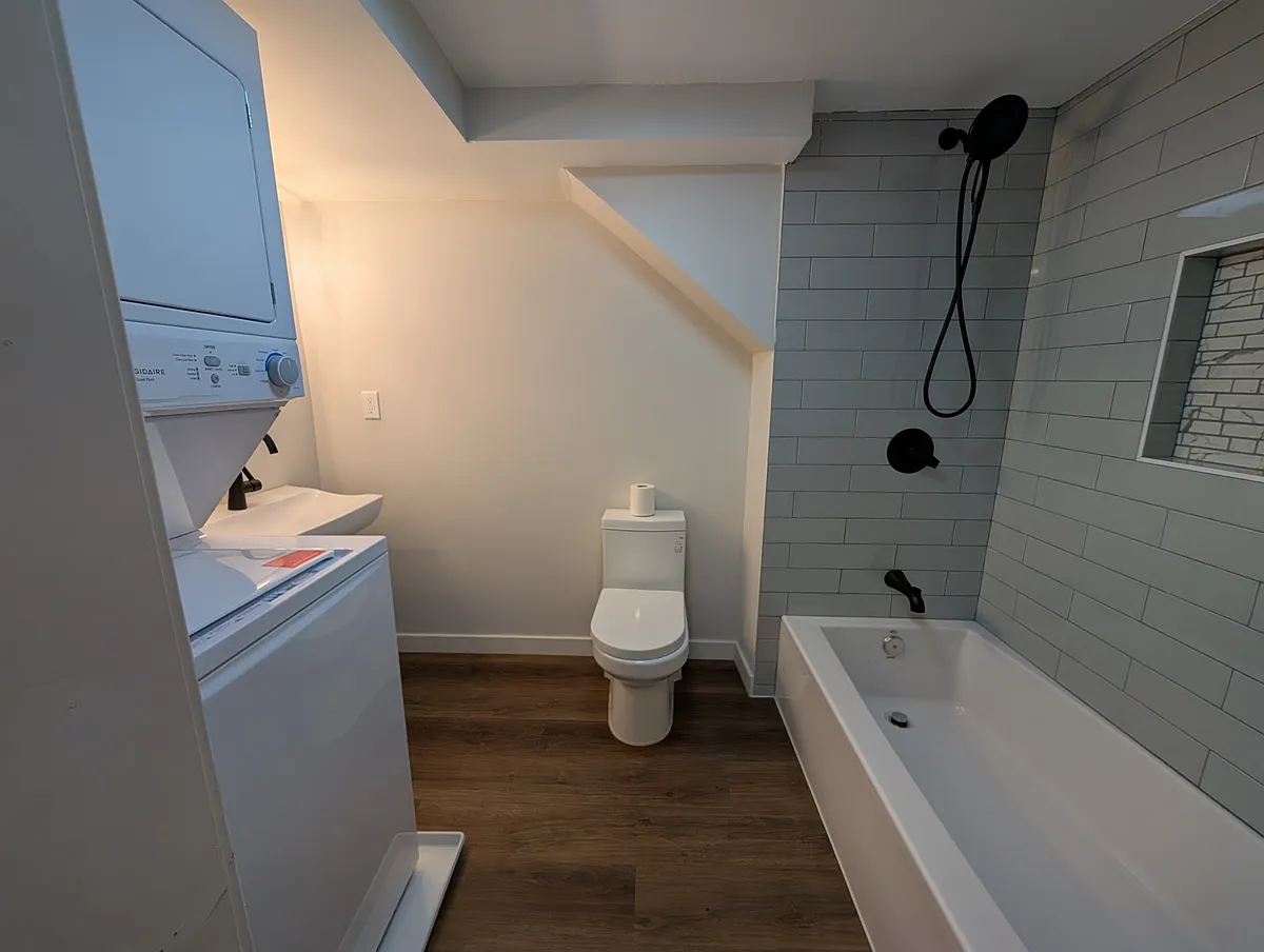 Bathroom entry. In-unit laundry. - 5936 34th Ave SW #B
