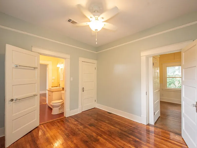 Rear bedroom with separate entrance off laundry area.