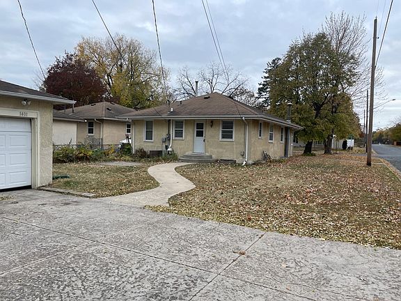 Back of home that walks out to 2 car garage.