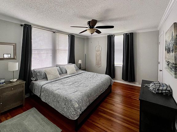 New King bed and Casper mattress. Bedroom connects to master bath.