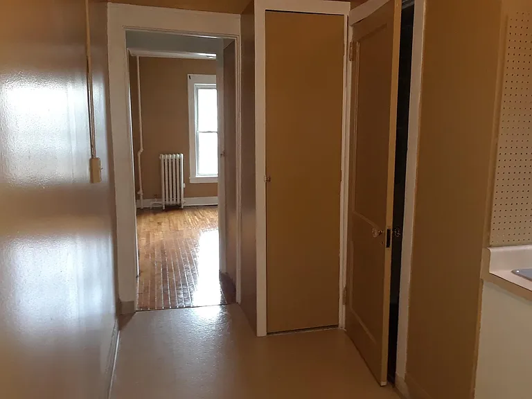 kitchen hallway looking into the bedroom