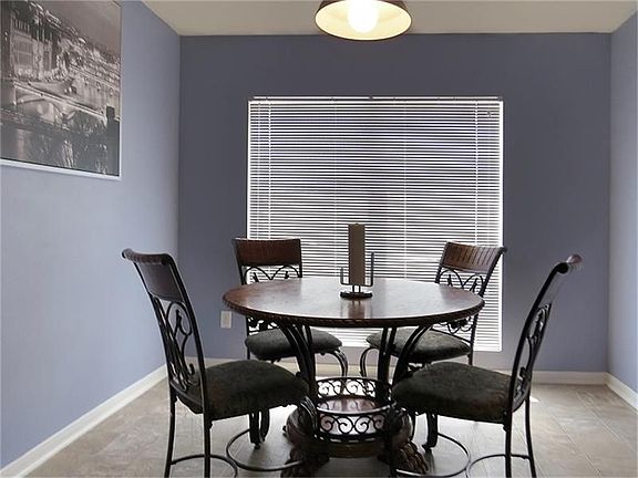 Breakfast room is handy to kitchen.