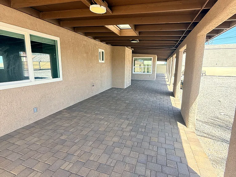 New paver tiles over the entire back patio