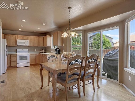 Enjoy family meals in the large dining area with bay windows!