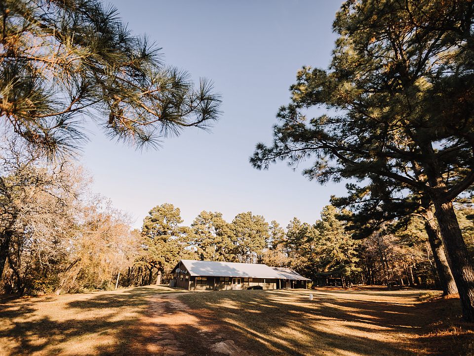 Nestled away from road with private circle drive.