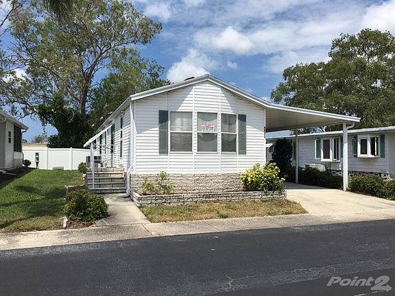 Perimeter lot with white vinyl fencing