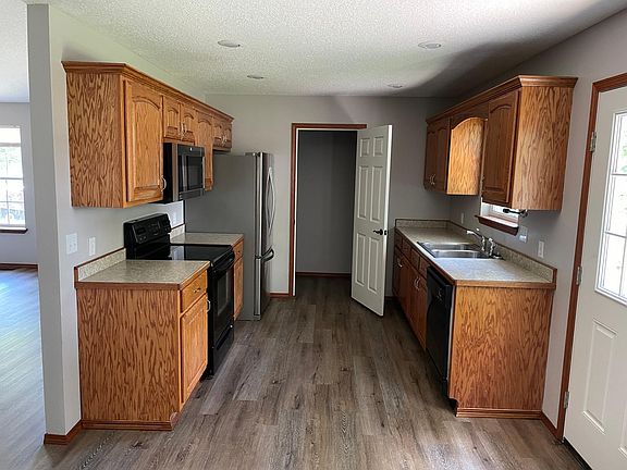 Kitchen with laundry room at the end