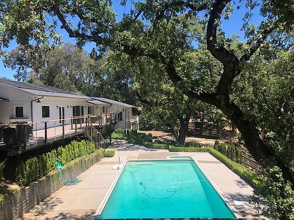 Large, recently landscape backyard with private pool