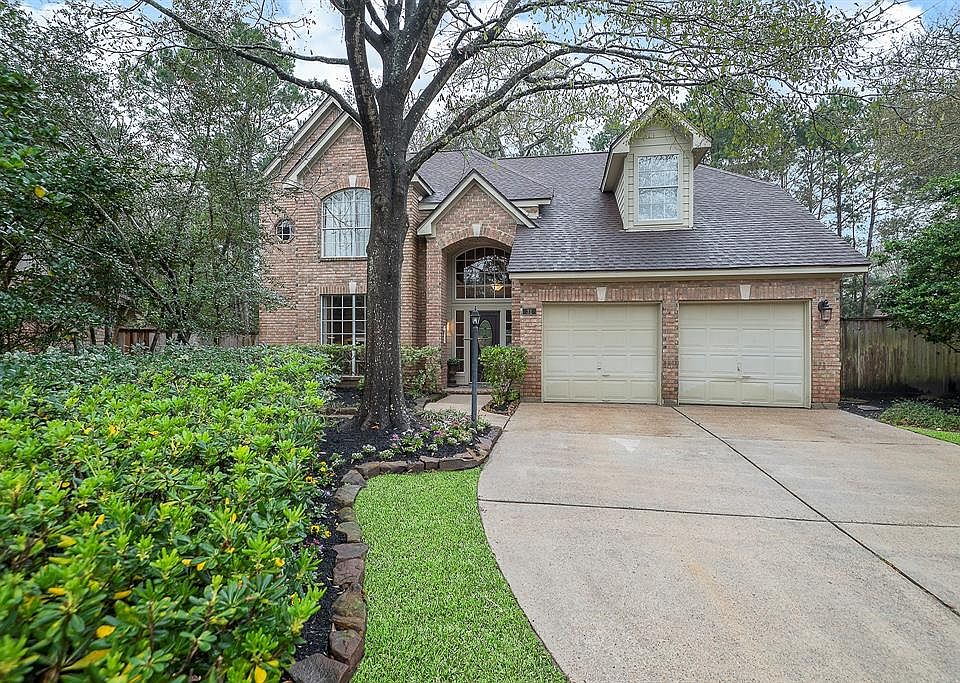 GORGEOUS ALL BRICK PATIO HOME IN HEART OF THE WOODLANDS!