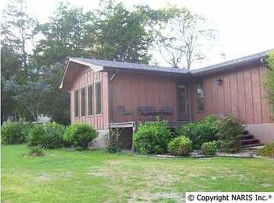 Front w/windows across living area