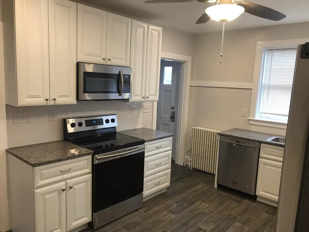 Kitchen, door to backyard - 504 Broadway St