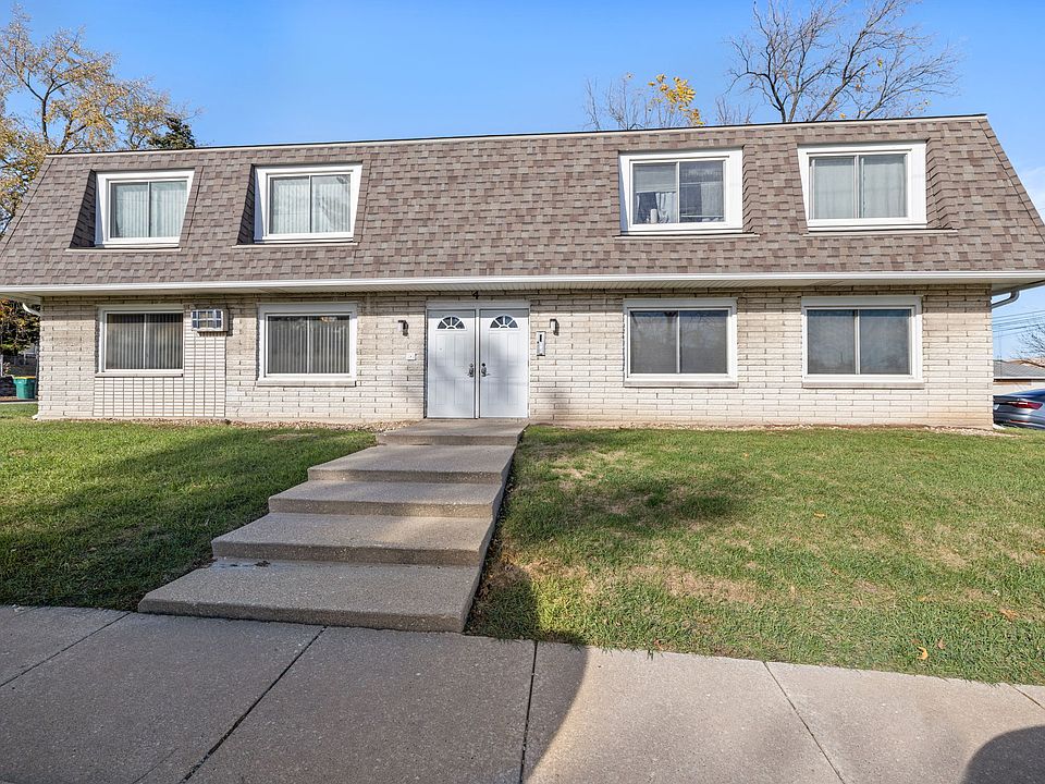 FRONT VIEW - From Washington Street. Apartment is on Lower left. Doors have keypads for secure access.