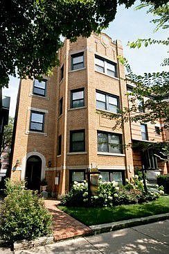Exterior Front - Vintage brick 3 story building 