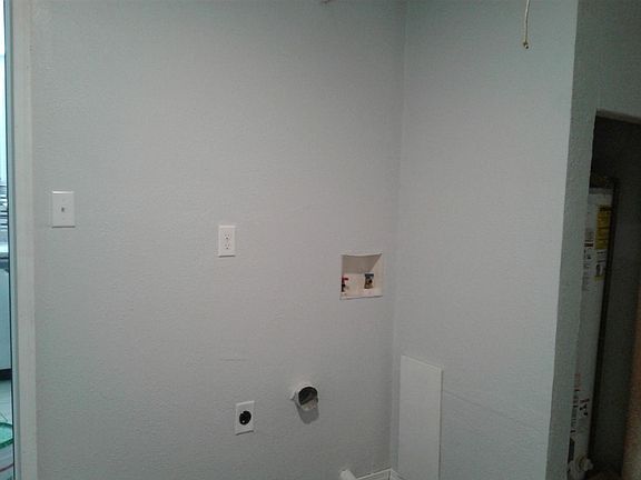 Laundry room , all new vinyl flooring , fresh paint and hot water heater, only 2 years old 40 gallons.