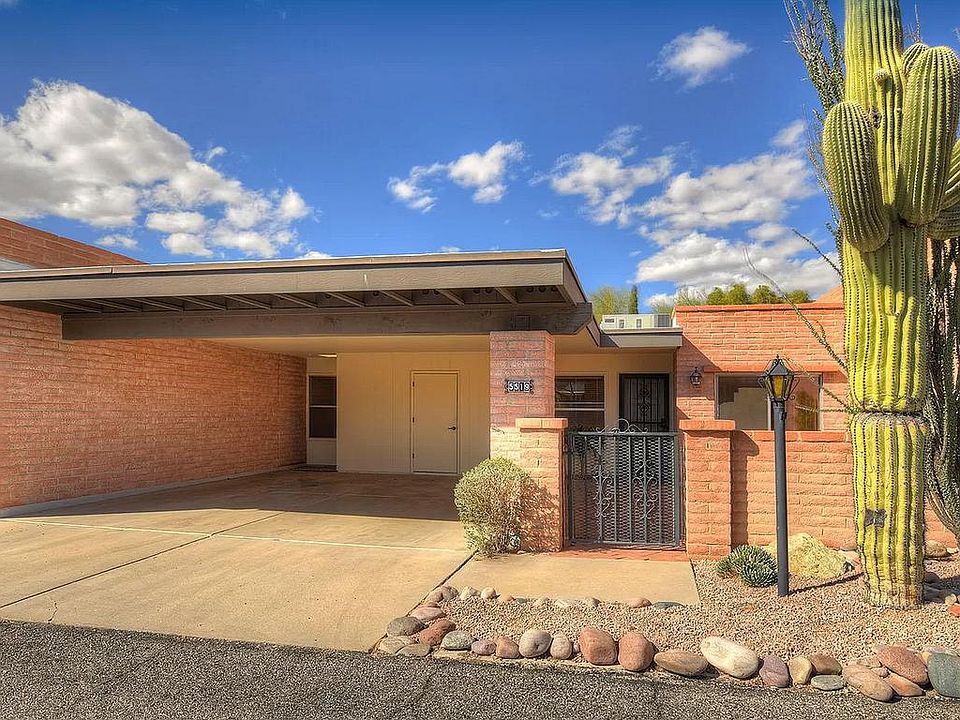 Front gate, courtyard and carport