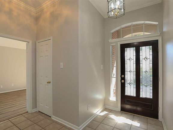Another View of Foyer with Access to Guest Bath and 2ndary Bedroom.