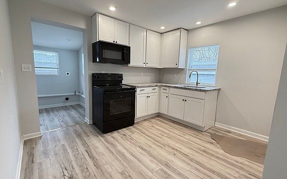 Eat in Kitchen with recessed lighting