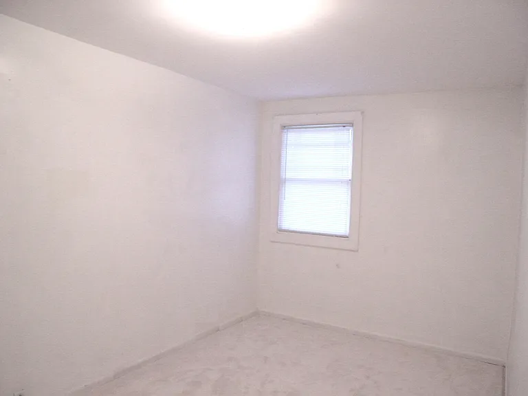 Bedroom unfurnished.