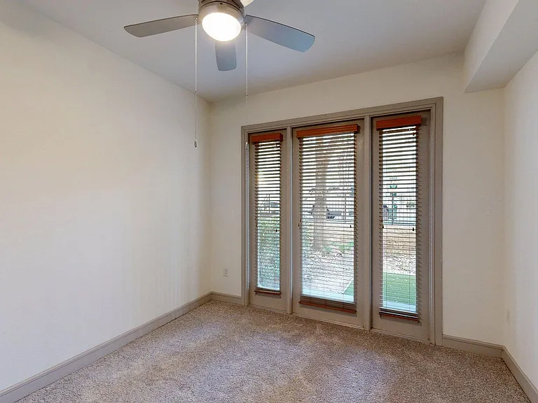 Spacious apartment Bedroom with Carpet Floor.