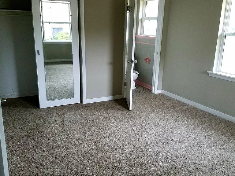 Master bedroom w/ half bath