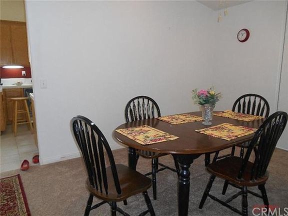 The formal dining area features a closet for linens or china.